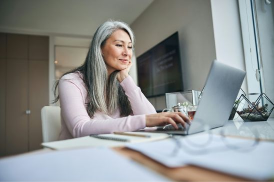 Woman reviewing her estate planning documents with a Fee-Only financial advisor in Fort Wayne, Indiana